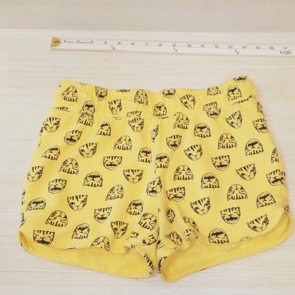 Cat and Jack kids shorts in yellow and cat faces black. Size xl 14/16 - Picture 2 of 4